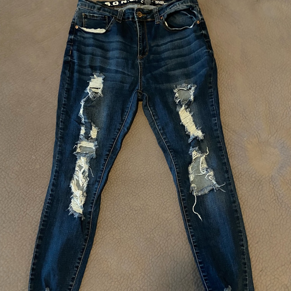 dark blue ripped curvy high rise skinny jeans